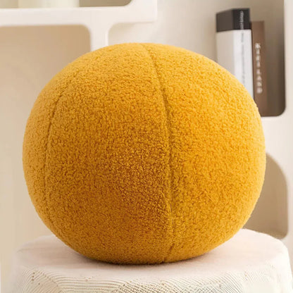 Oreiller en peluche en forme de boule