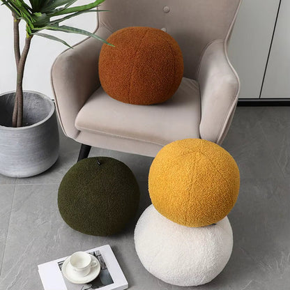 Oreiller en peluche en forme de boule